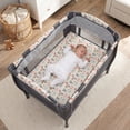 Baby Trend Lil' Snooze Deluxe II Nursery Center Playard with Napper, Changer, Full-Size Bassinet and Travel Bag, Forest Party Grey